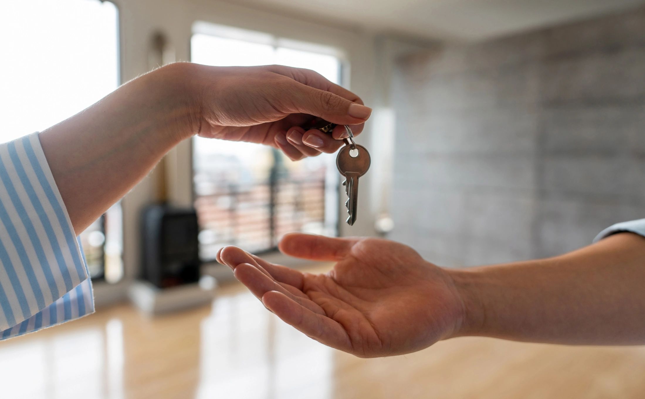 Handing over apartment keys during check-in