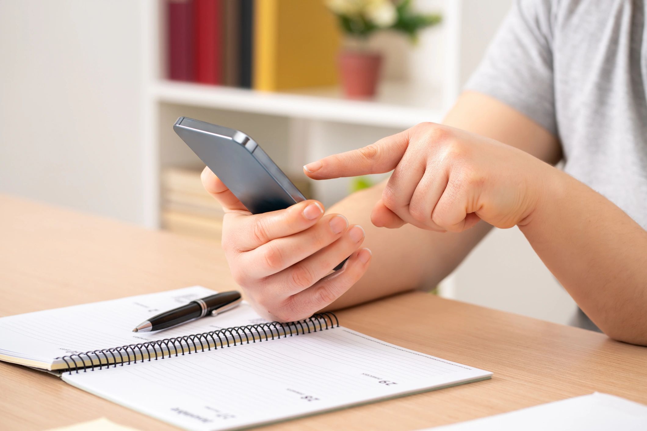 Checking a booking calendar on a smartphone
