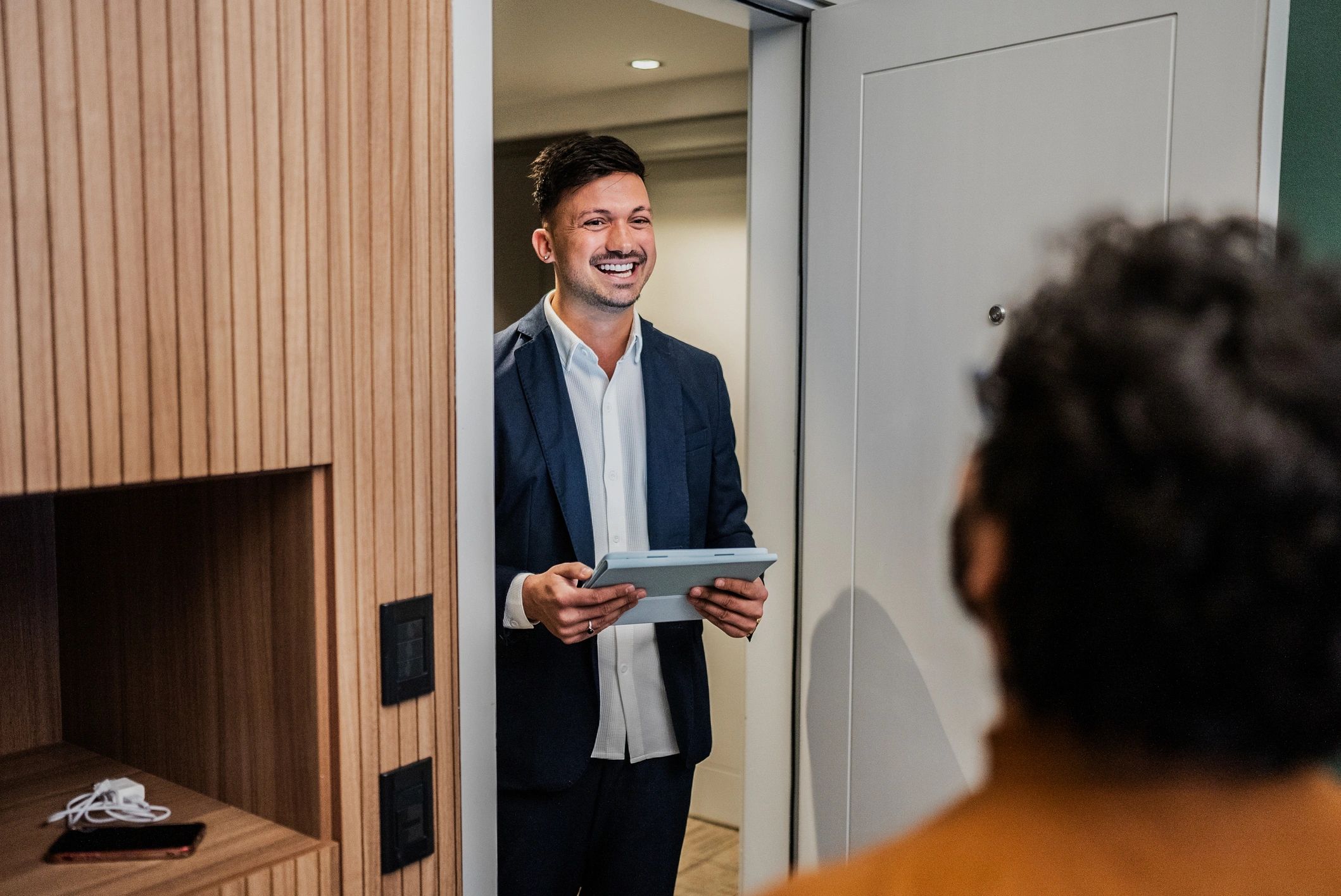 Concierge assisting guests at check-in