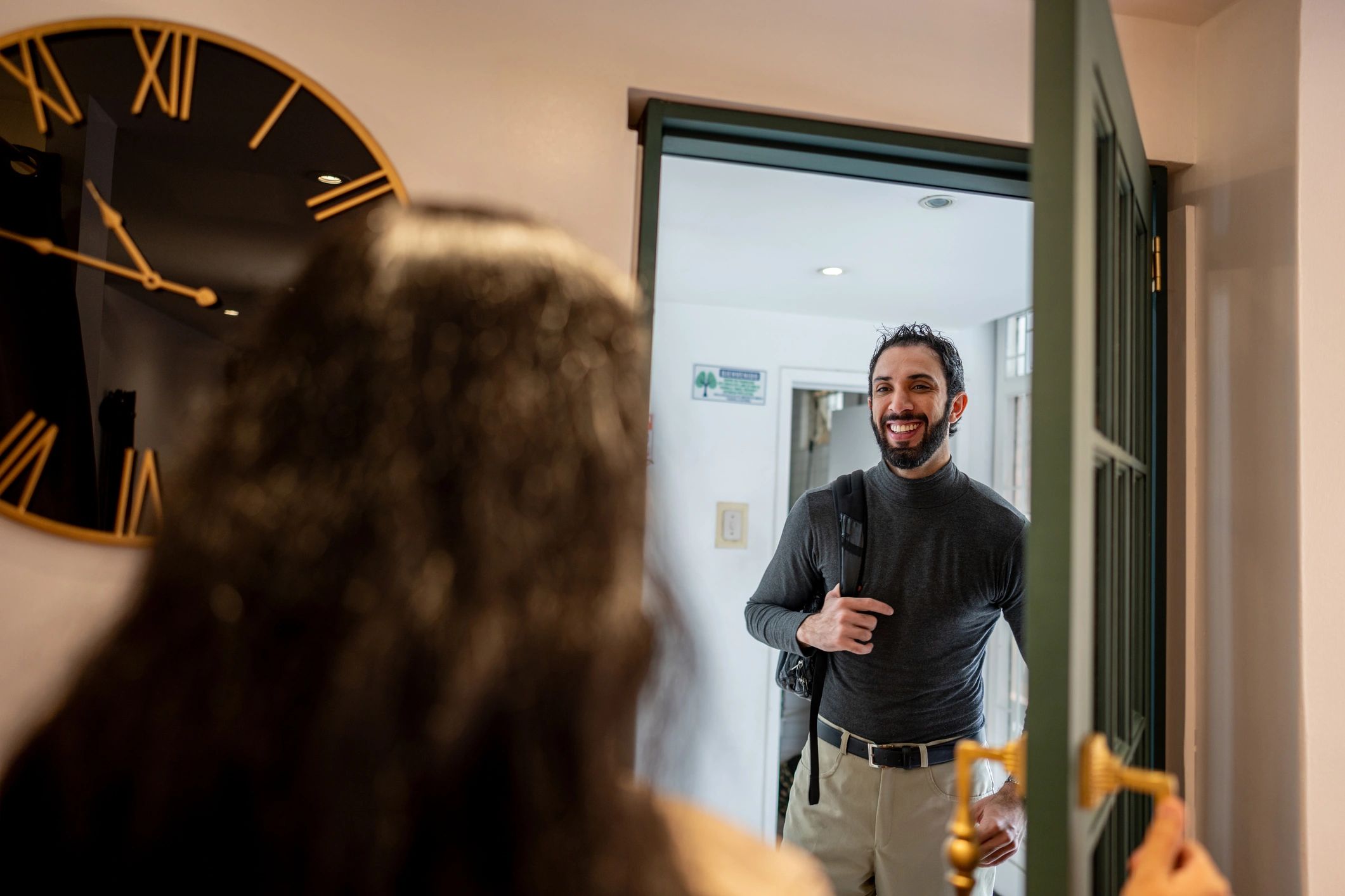 Guest being greeted at the door